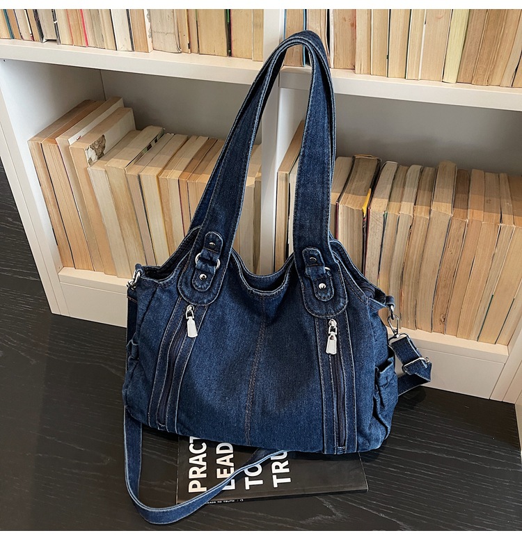 Bolsas de tendencia transfronteriza de gran capacidad para mujeres 2026 primavera nuevo retro jeans mochila de viaje simple tote