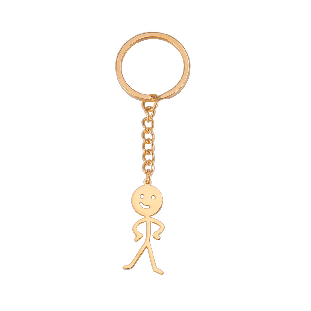 Venta caliente personalizada lindo todo partido simple golpe hueco cara sonriente villano brillante colgante llavero de acero inoxidable
