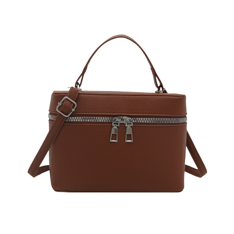 Bolsos para mujer nuevo estilo 2025 primavera nicho todo-fósforo bolso de mensajero de moda de hombro patrón de lichi bolso de cubo de lujo ligero