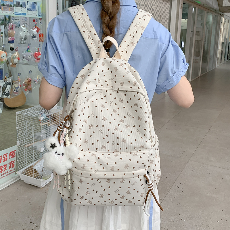 Minimalist ins-style fresh backpack for college students, unisex, with bow tie, lightweight, large capacity, versatile backpack