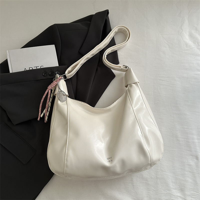 Bolsa de viaje casual de gran capacidad para mujeres 2025 primavera y verano nueva moda versátil hombro de hombro con una sensación relajada bolso