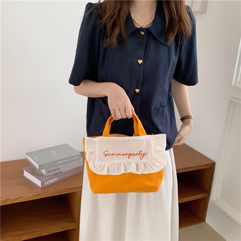 1441 Japanese and Korean chic Sweet ruffled bento Bag, Fresh embroidered hand-held small cloth bag, girl student bag wholesale undefined