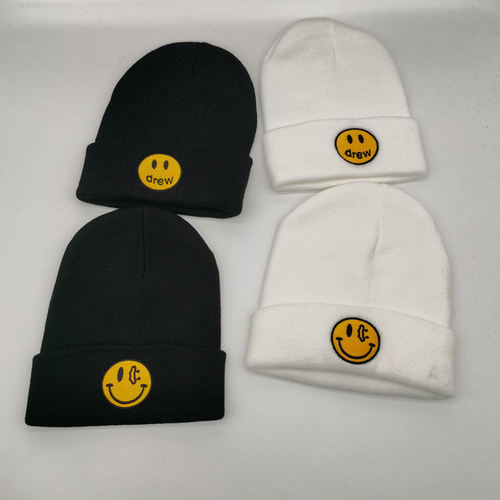 Adult yellow label smiley draw cold hat for men and women knitted hat spring, autumn and winter warm woolen hat couple hat student hat