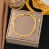 Blade, round beads, golden ankle bracelet