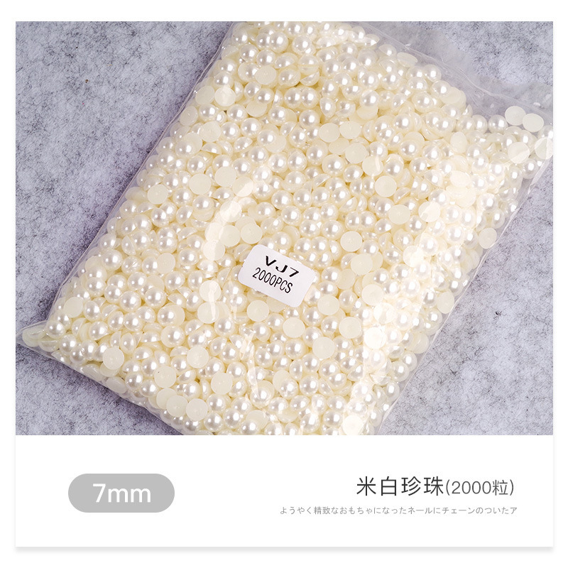 Venta al por mayor blanco beige tamaño semicírculo perla tridimensional paquete DIY hecho a mano uñas joyas de perlas planas