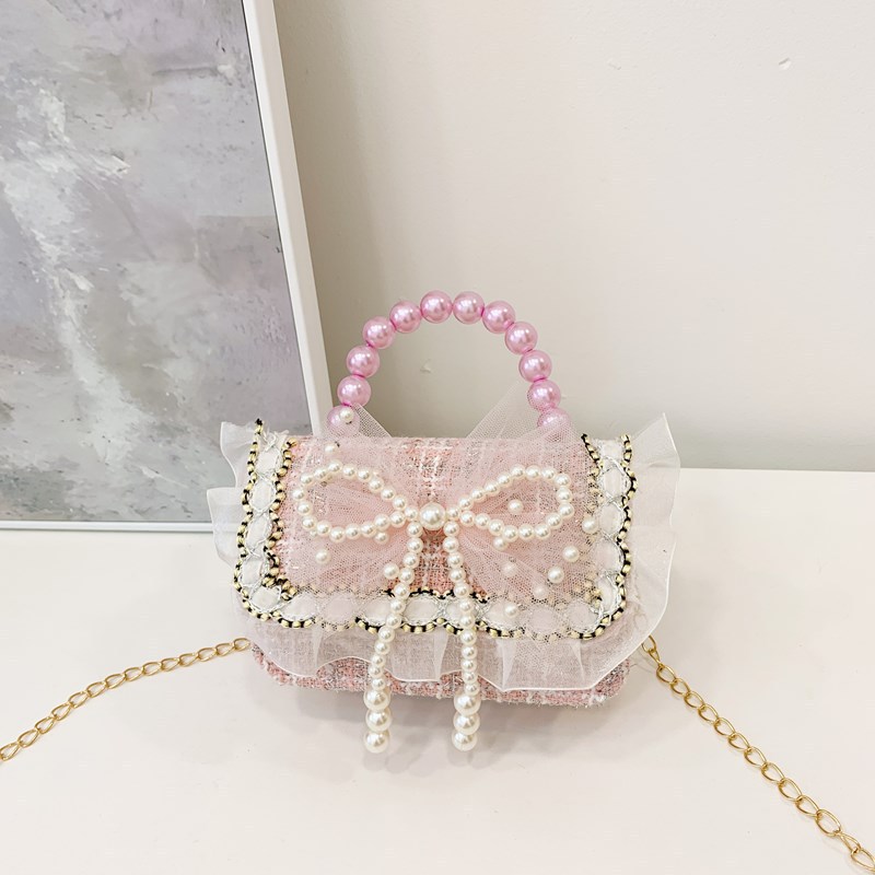 Niña tween pequeña bolsa de hombro arco encantadora princesa mochila de perlas de aire extranjero para niños bolsos lotes