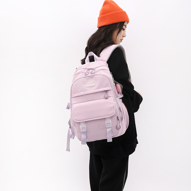 Mochila de nylon ligera de estudiante de escuela primaria de invierno para niñas transfronterizas mochila de estudiante de secundaria al por mayor entrega de una pieza