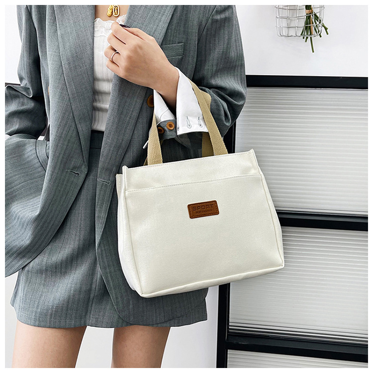 New wholesale fashionable and high-quality canvas handbag, simple and portable, easy to carry for going out, versatile lunch box and bento bag undefined