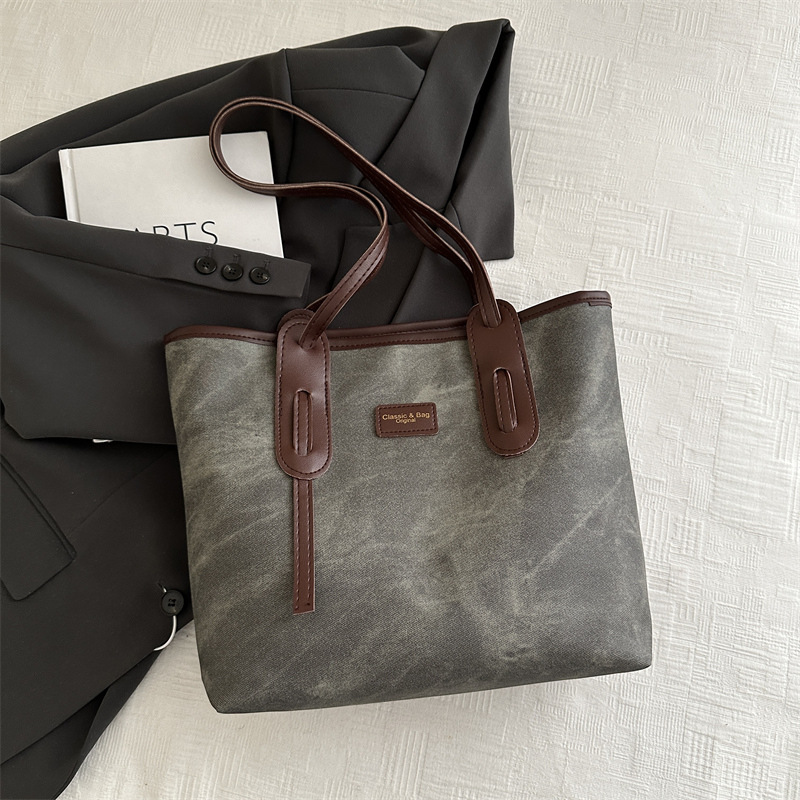 Bolso retro de gran capacidad para mujeres 2024 nueva moda textura bolso de hombro simple empalme bolso de viaje