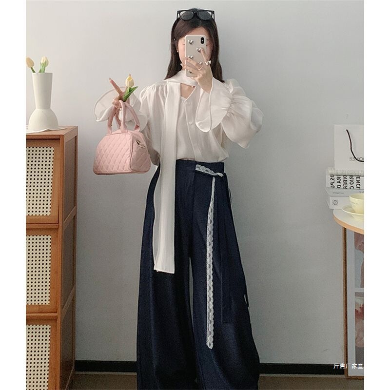 French-Style White Flutter Collar Bell Sleeve Shirt with Lace Tie and Navy Blue High-Waisted Wide-Leg Pants Set for Women