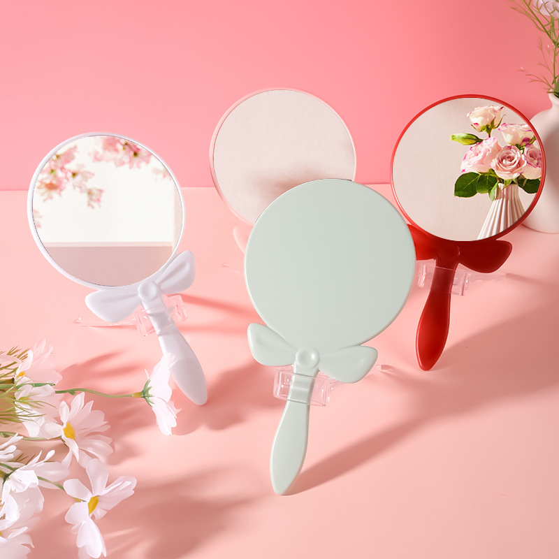 Espejo de maquillaje con mango en arco | Diseño creativo, personalizable con logo, venta al por mayor