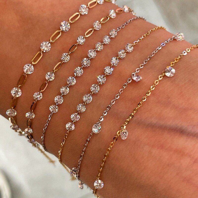 S925 sterling silver, 18K gold-plated, sparkling cubic zirconia bracelet, featuring a starry design, minimalist and luxurious, perfect for layering S925 sterling silver, 18K gold-plated, sparkling cubic zirconia bracelet, featuring a starry design, minimalist and luxurious, perfect for layering