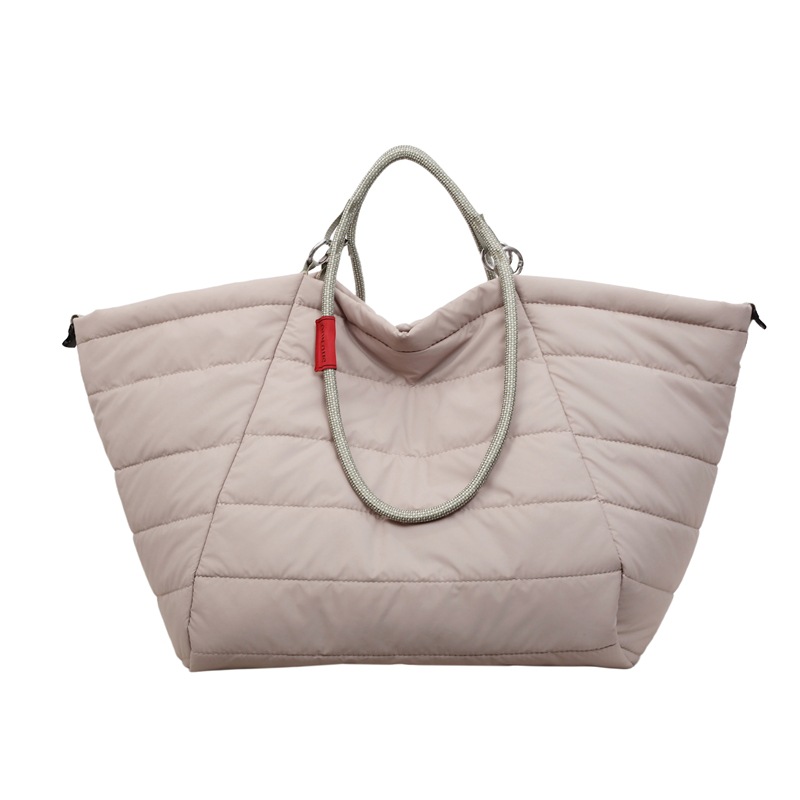 Simple primavera y verano nuevo 2026 nube hombro bolsa de gran capacidad de viaje de viaje de acondicionamiento físico bolso portátil mujer