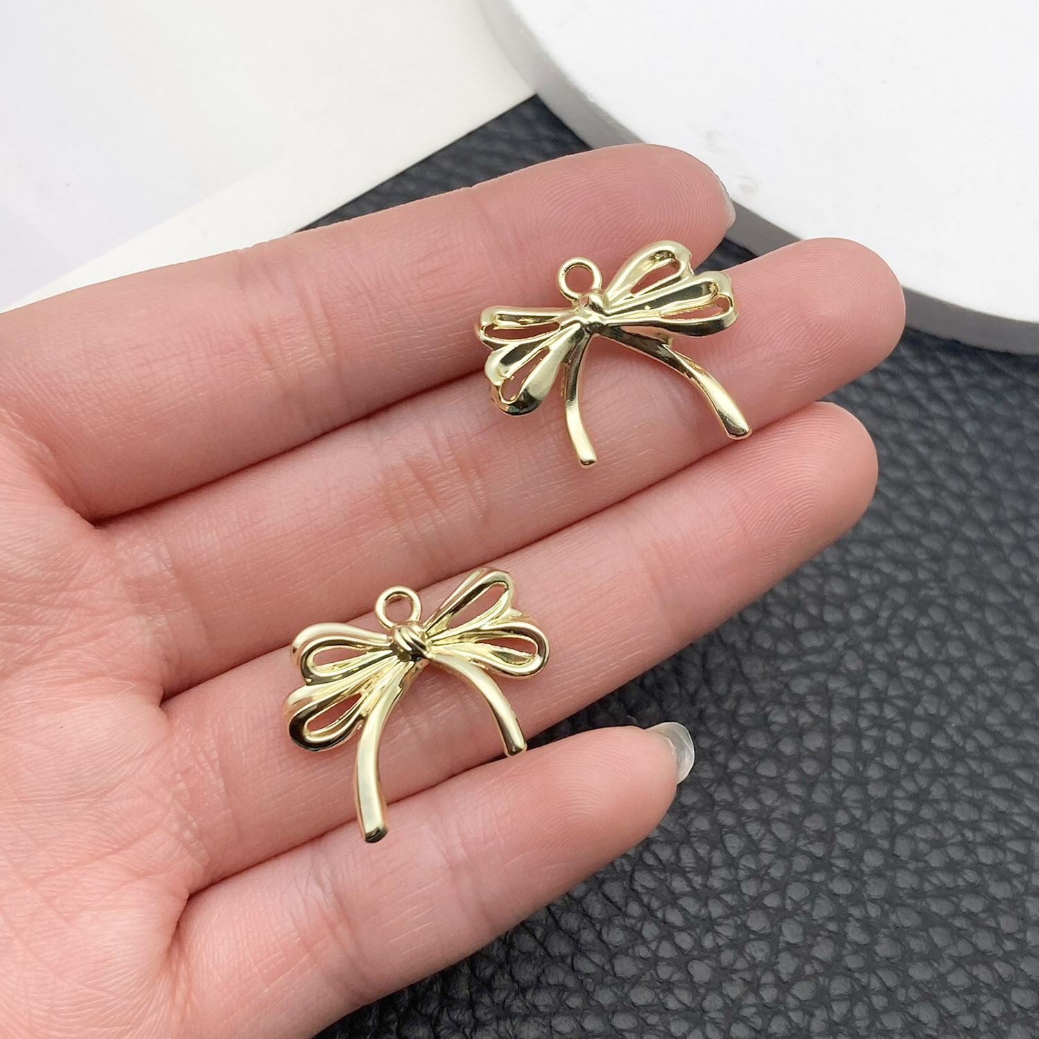 21406-DL-KC金保色锌合金双层镂空蝴蝶结19x22m