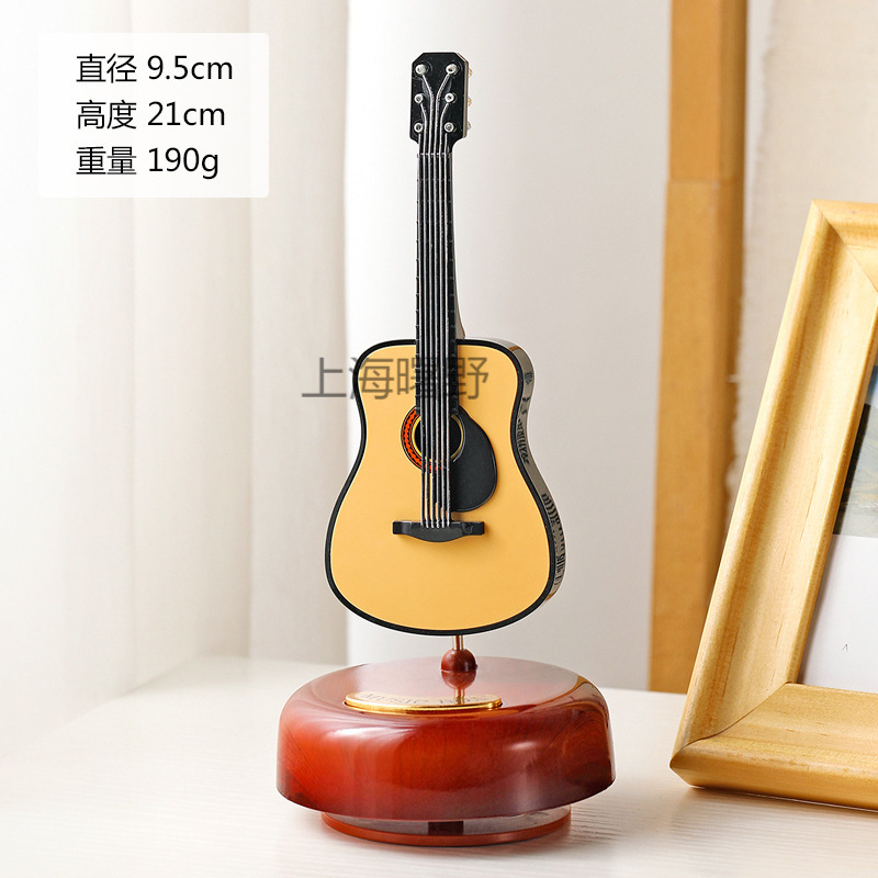 Classic rotating guitar, violin, table music box