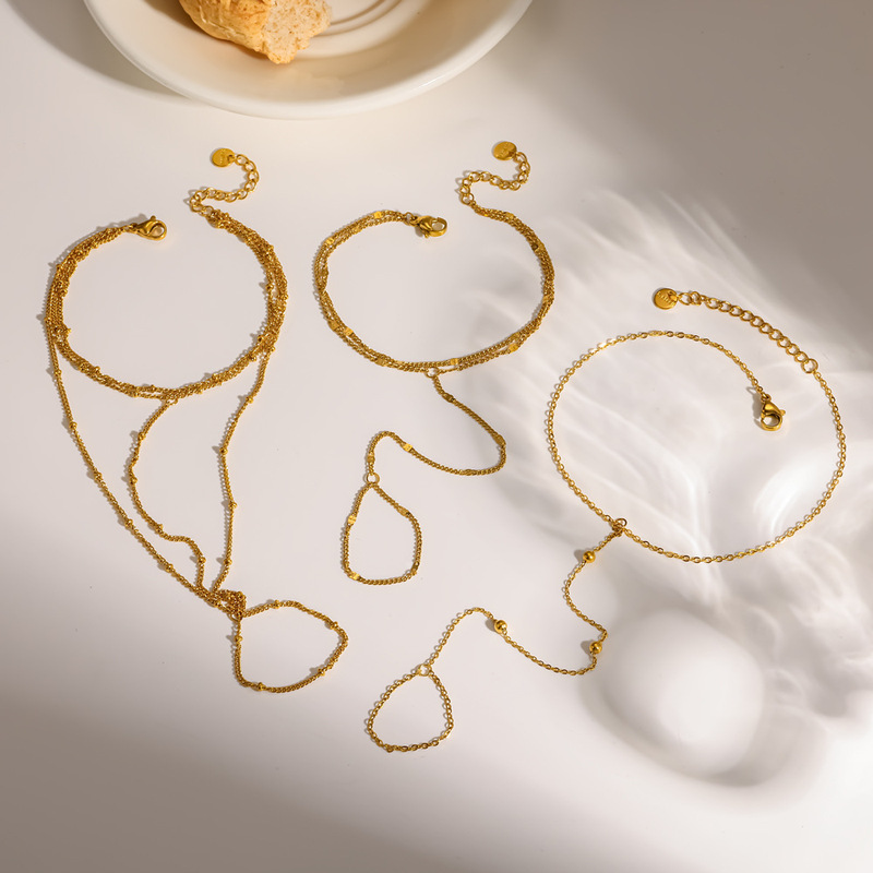 European and American casual style 18K gold stainless steel finger chain, light luxury versatile diamond-studded non-fading stackable ring chain for cross-border sales European and American casual style 18K gold stainless steel finger chain, light luxury versatile diamond-studded non-fading stackable ring chain for cross-border sales