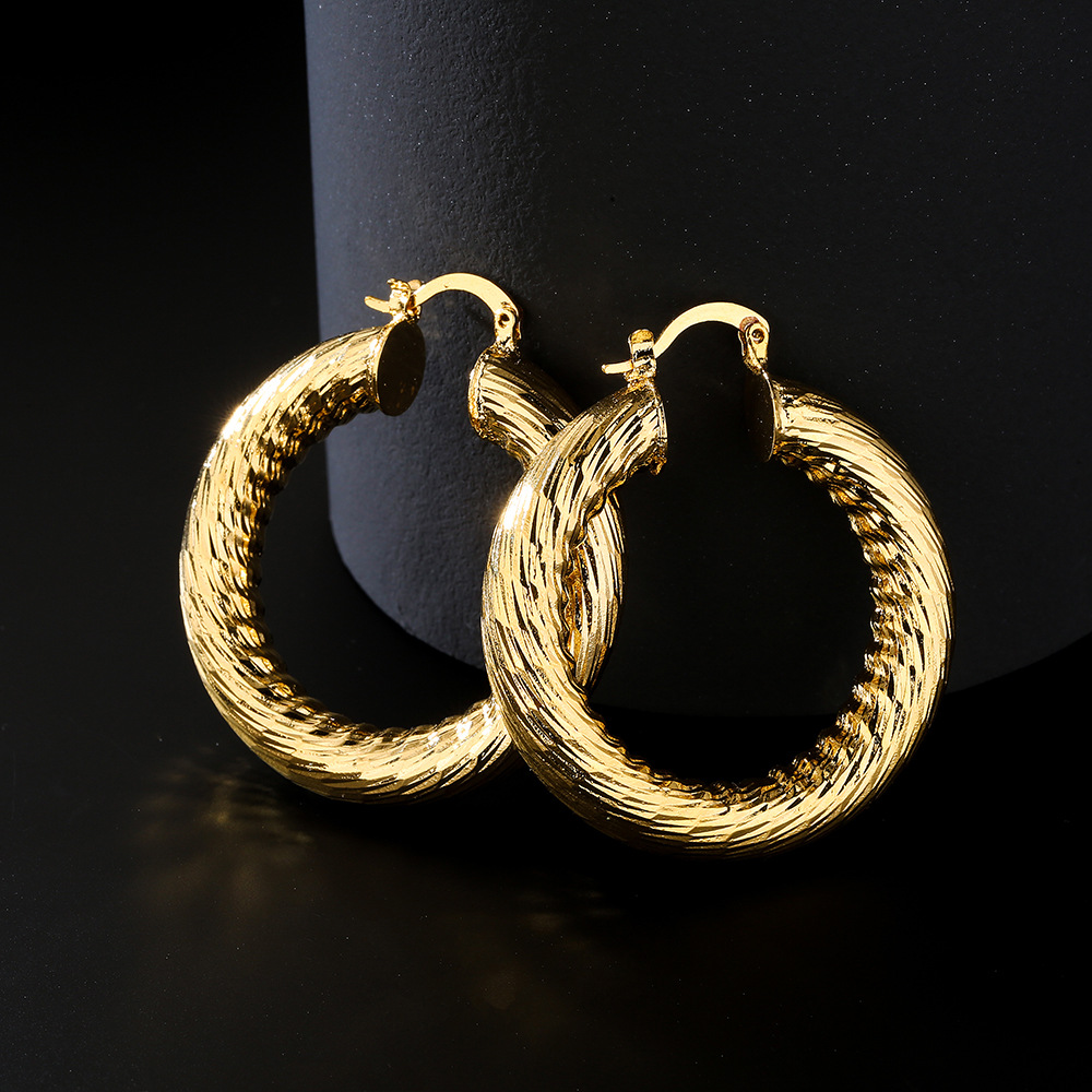 Fashion simple round copper plated 18K gold earrings women