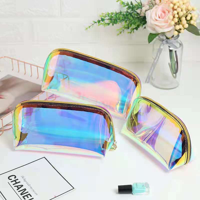 En stock al por mayor láser TPU bolsa de cosméticos impermeable colorido PVC Shell lavado bolsa de almacenamiento transfronterizo moda pequeña caja de lápices