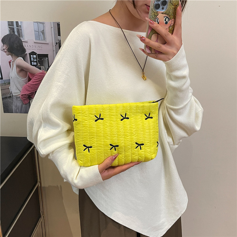 2025 invierno nueva moda portátil bolso de mano mecha de moda impresión mariposa de maquillaje de gran capacidad bolso de mano