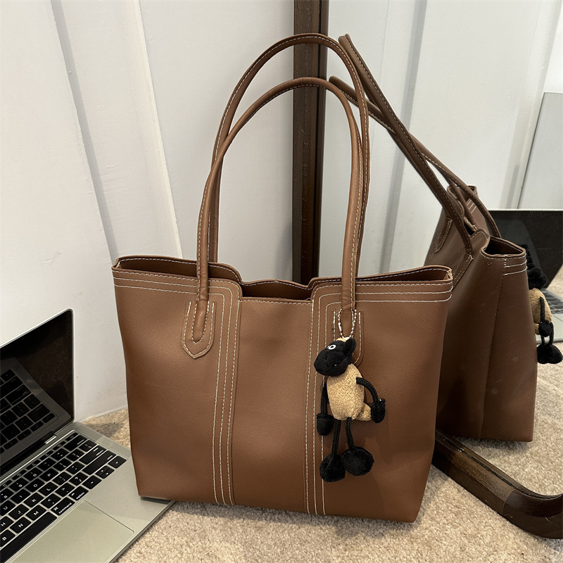 Estilo coreano versátil bolso texturizado de las mujeres 2023 otoño e invierno nuevo hombro axila bolsa popular bolsa de asas este año