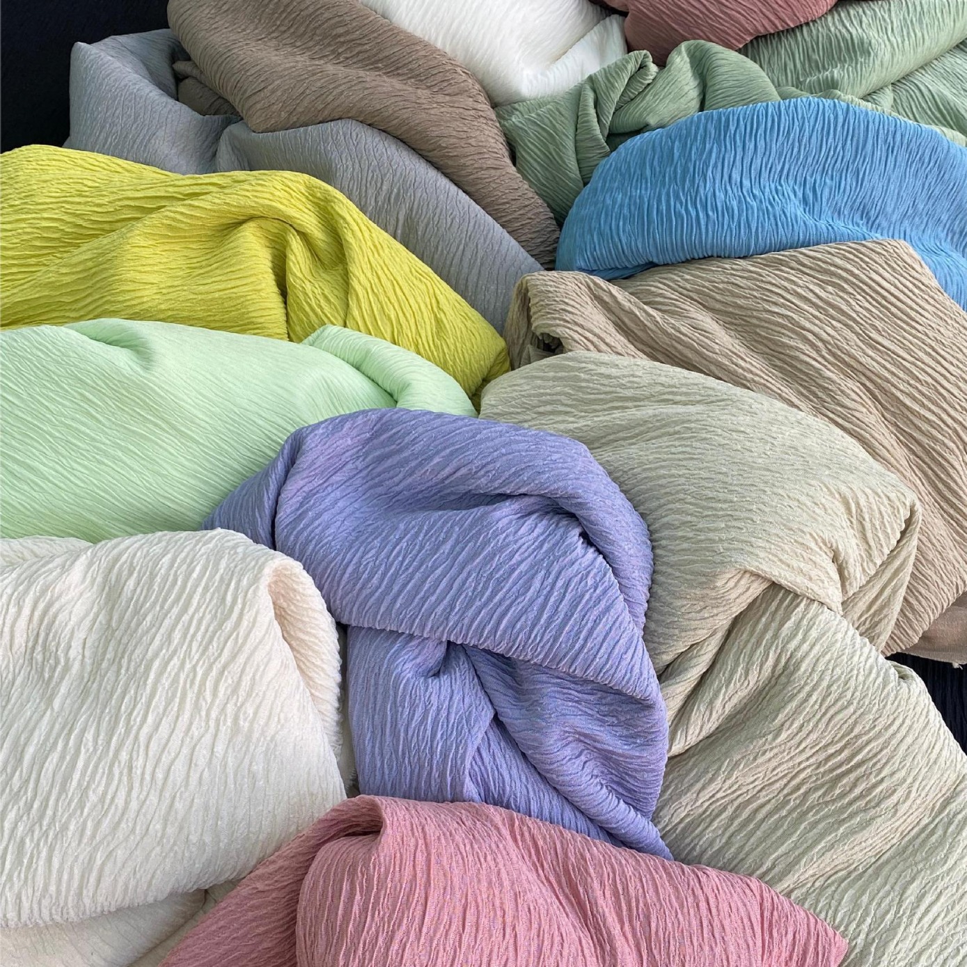 褶皱肌理针织面料皱提花面料女装童装牛肚布料树皮皱泡泡布千千叶