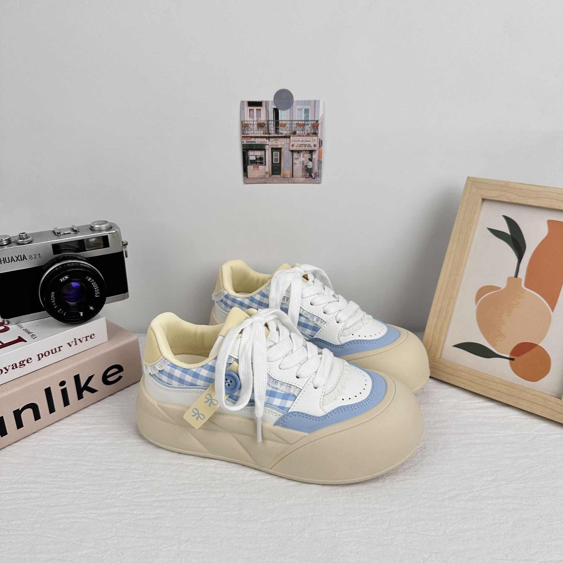 Zapatos de onda lejana para mujer 2025 nuevos zapatos de pan de estilo caliente zapatos blancos de suela gruesa zapatos de tabla zapatos casuales de nicho de todo fósforo