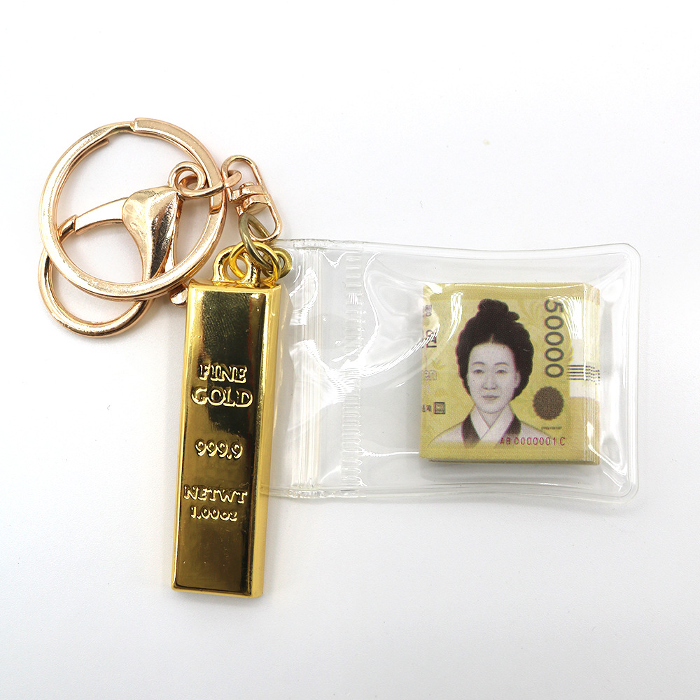 Simulación de dólar de Taiwán, dólar estadounidense, libra, won coreano, moneda indonesia, llavero, colgante de billetes de papel, medalla de oro, colgante de barra de oro, máquina de bebé
