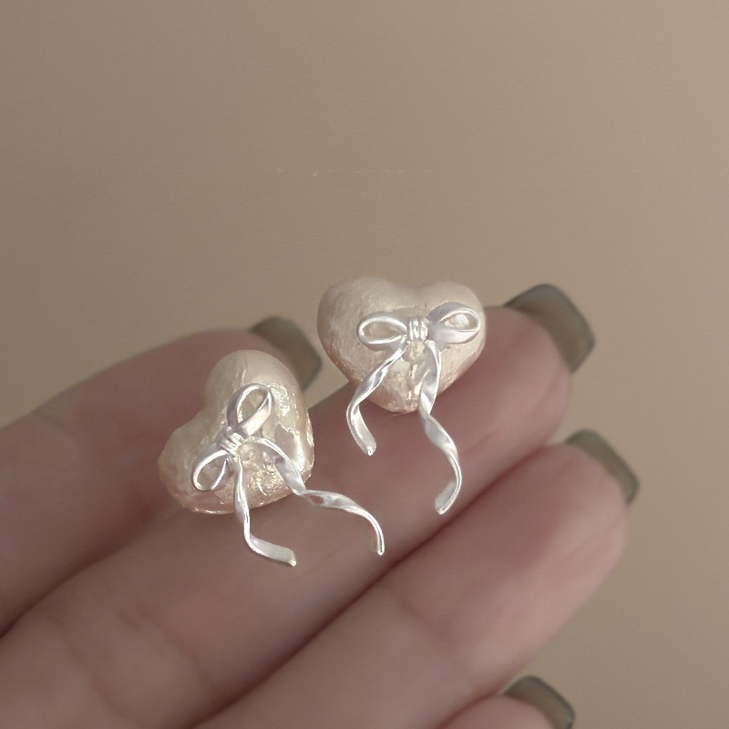 Aguja de plata, perla, circón, borla, pendientes de moda, lujo ligero, pendientes de alta gama, pendientes de todo fósforo exquisitos de nicho, mujeres al por mayor