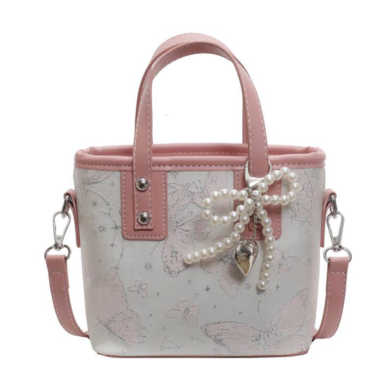 Bolsa de cubo de mano para mujeres 2025 nuevo estilo nacional popular bolso de hombro alta textura versátil bolso de moda moda