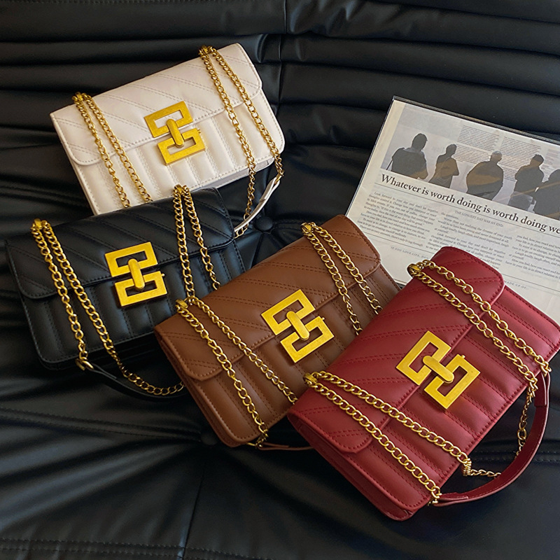 Primavera retro bolsos de mujer 2024 nuevo popular explosivo bolso de cinturón de cadena de moda bolso de hombro