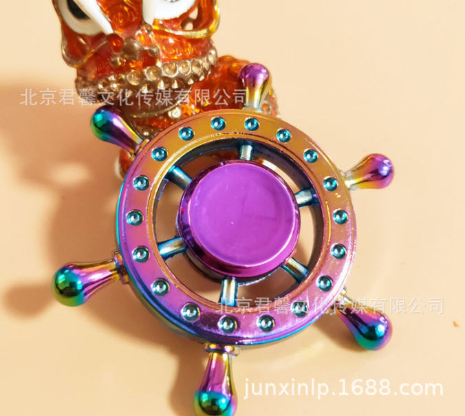 B Dedos de araña de colores, peonza, yema del dedo de metal de tres hojas, peonza de dos hojas, productos pequeños, suministro al por mayor