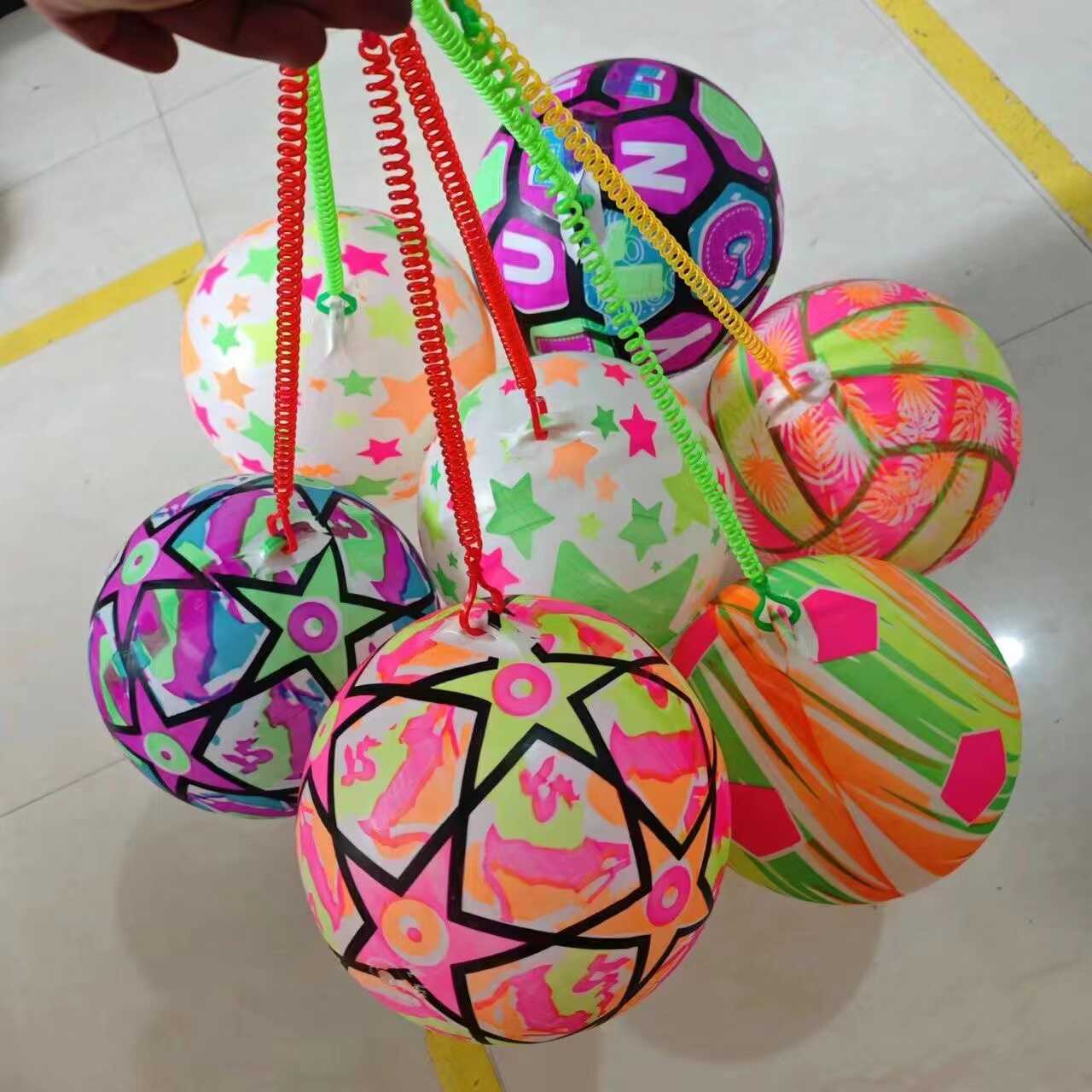 Wholesale Hot Selling Children's Toys Night Market Stall Colorful Rope Ball Elastic Inflatable Cartoon Football Chain Watermelon Ball