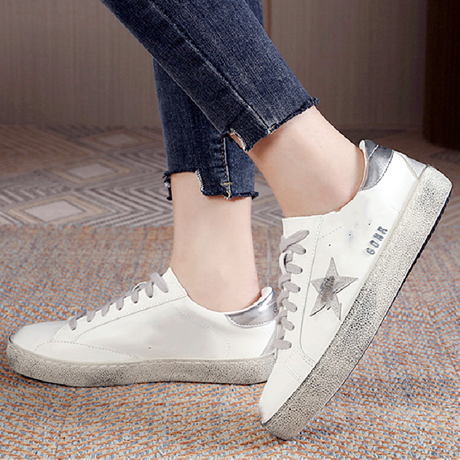 Zapatillas de deporte blancas pequeñas retro Harajuku multi-fósforo calle tiro estrella estudiante talla grande 44 pareja familia zapatos sucios exportación estilo caliente