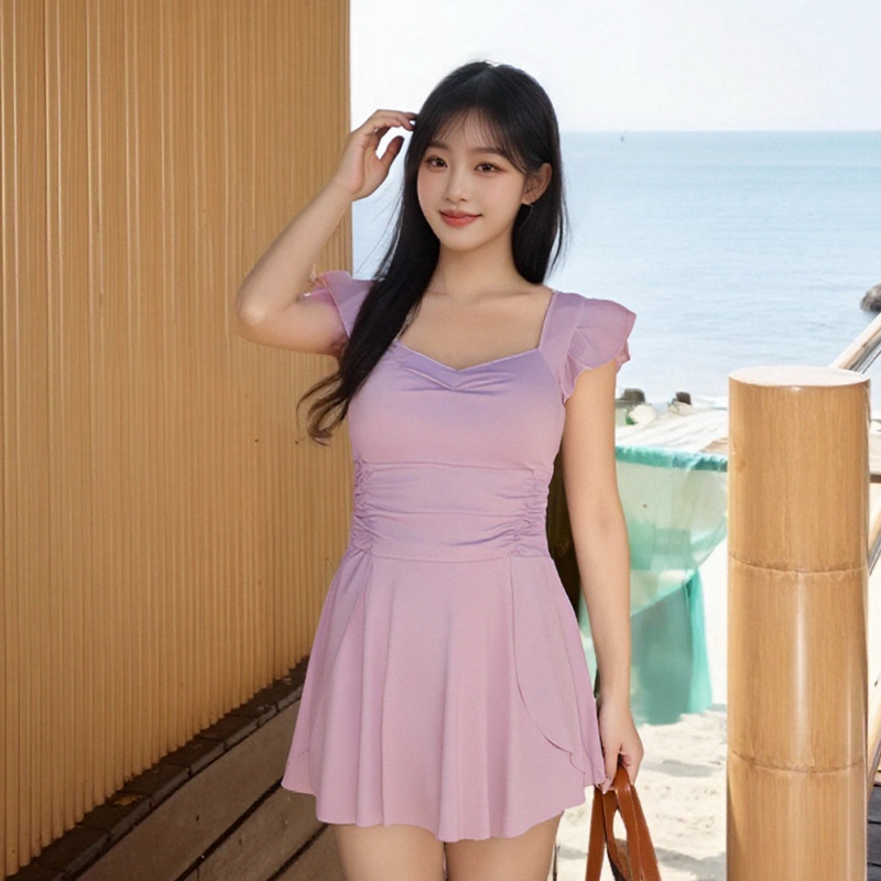 Traje de baño de una pieza de seda de leche para mujer 2025 estilo de verano traje de baño de una pieza de alto valor para mujer falda conservadora que cubre la barriga delgada