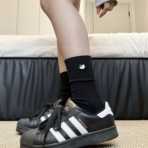 Autumn and winter double-needle cartoon KT cat cute pendant socks women's middle tube socks ins trendy all-matching outerwear solid color pile socks