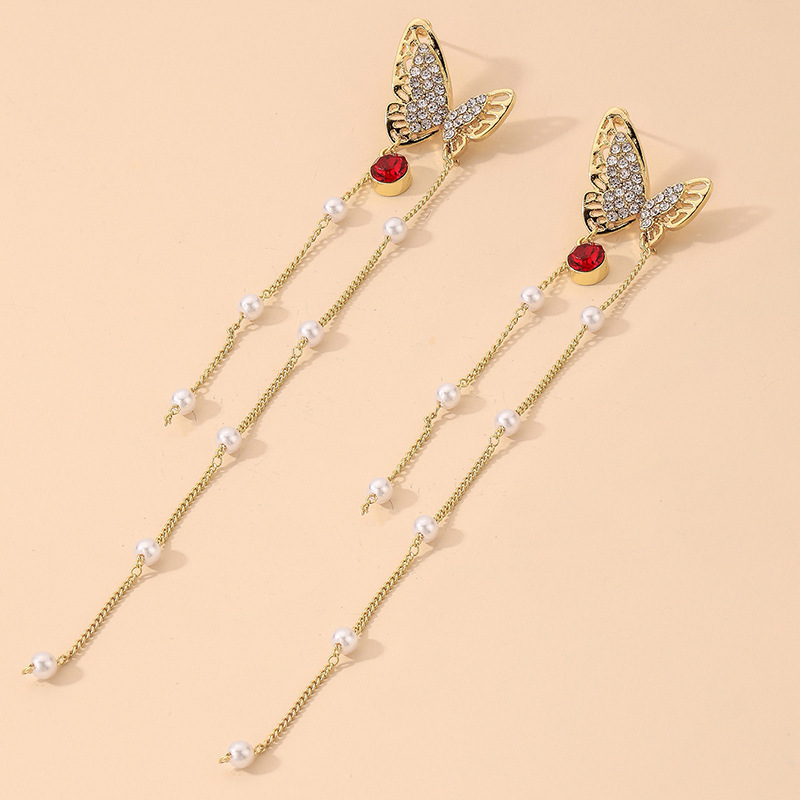 Nihaojewelry Jewelry Wholesale Retro Pearl Rhinestone Butterfly Tassel Earrings display picture 7