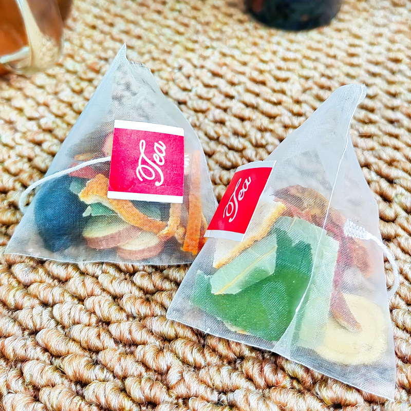 黒梅と蓮の葉のドリンク、黒梅と蓮の葉、サンザシ、甘草、みかんの皮の組み合わせ茶、三角袋、個別包装、人気の電子商取引商品|undefined