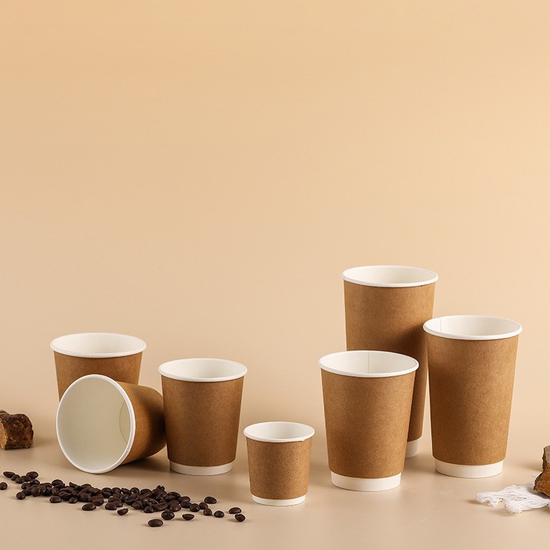 Taza de papel desechable al por mayor de papel Kraft taza hueca de doble capa para llevar café leche taza de té con tapa taza de papel creativo rojo neto