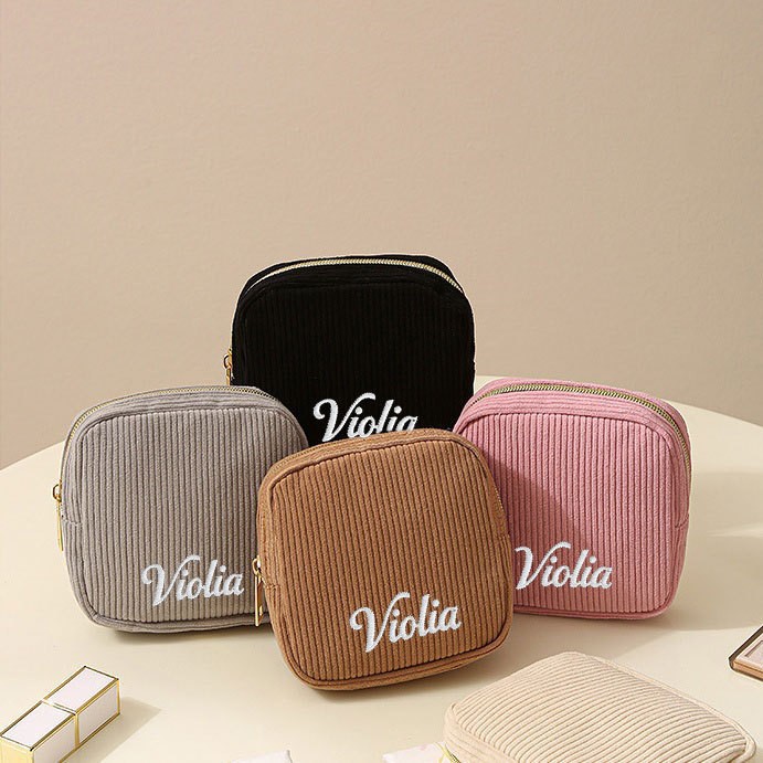 etsy's best-selling embroidered seersucker striped makeup bag, simple, portable, trendy, and popular among young women.