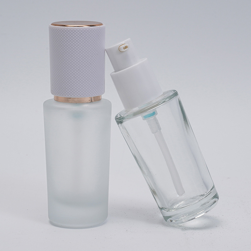 現物30ml透明つや消し厚い底の円柱の瓶の粉の底の液体の瓶の乳液はポンプの頭を押して瓶を分けて卸売りします。|undefined