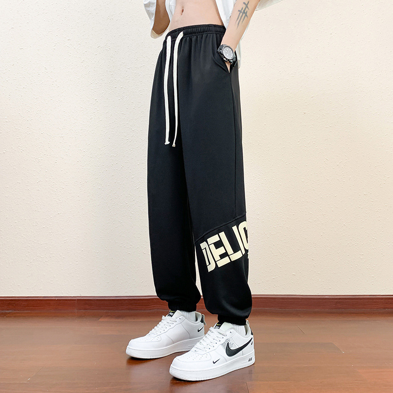 Pantalones cortos deportivos de hielo negro para hombres verano 2024 nueva marca de moda americana suelta rápida secado recto pantalones casuales de cinco puntos