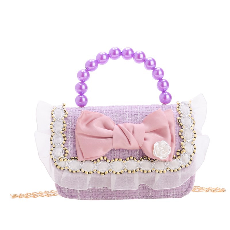 Bolsa de hombro coreana para niñas, arco de perlas, lindas flores, bolso de mochila para bebés, nuevo tipo de bolso para niños fragante.