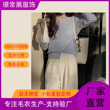 设计感不规则镂空羊毛针织衫女圆领单排扣清新甜美宽松开衫长袖