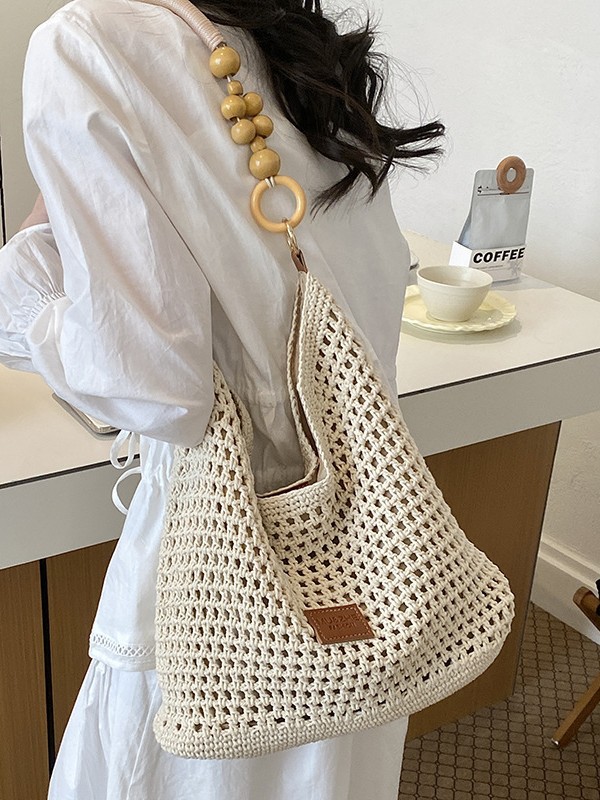 Bolsas de gran capacidad de tejido hueco para mujeres 2026 nuevas bolsas de playa de vacaciones en la playa de viaje nicho brazo Tote image 3