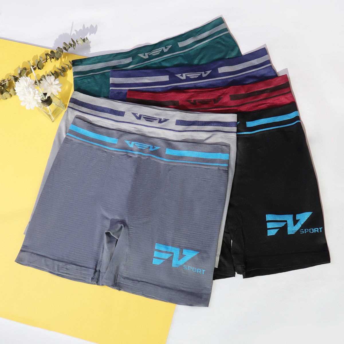 Calzoncillos bóxer deportivos para hombre, de cintura media, sin costuras, de poliéster elástico, transpirable, con sensación de desnudez, de color sólido, de pierna larga.