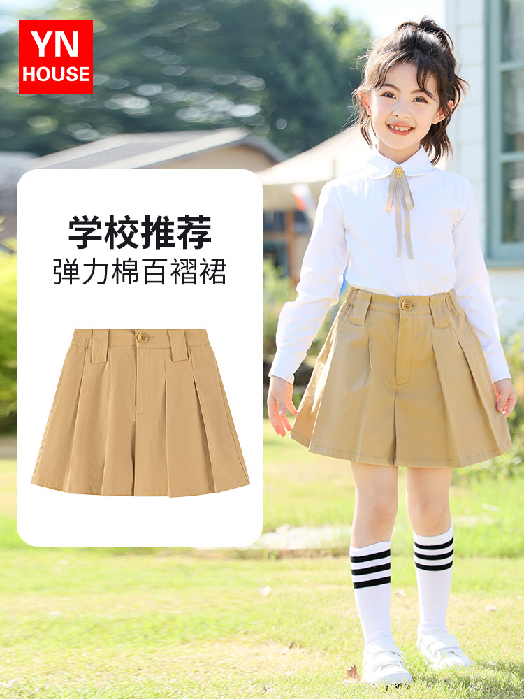 Falda de estilo universitario para niñas Falda de uniforme escolar caqui para niños Nuevos productos de otoño Falda plisada para estudiantes de escuela primaria de jardín de infantes