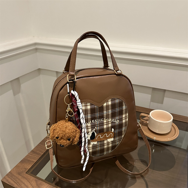 thumbnail image 1 of 2025 Nuevo modelo de moda, bolso de mano para mujer multiusos, mochila de viaje retro con bordado de perro y cuadros., 1 of 10