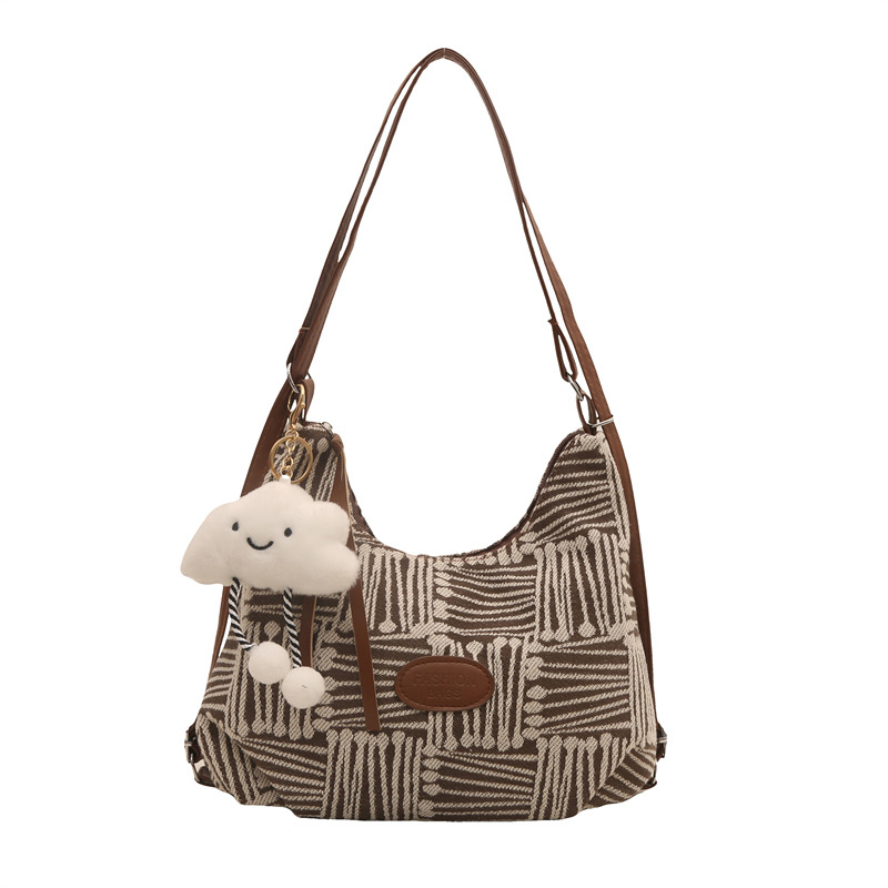 Bolso de lona para mujeres 2024 nuevo otoño bolso universitario de doble propósito mochila de hombro de viaje universal mochila de hombro