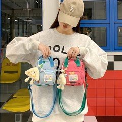 2025新型の女の子の赤ちゃんのショルダーバッグのファッションの男の子は小銭の斜めのショルダーバッグのかわいい子供のカバンに外出します。