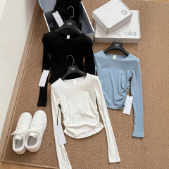 高バージョンの元の標準aloシンプルなサイドのしわの長袖のtシャツの女性の修身はやせているファッションの底のシャツの上着を現します。